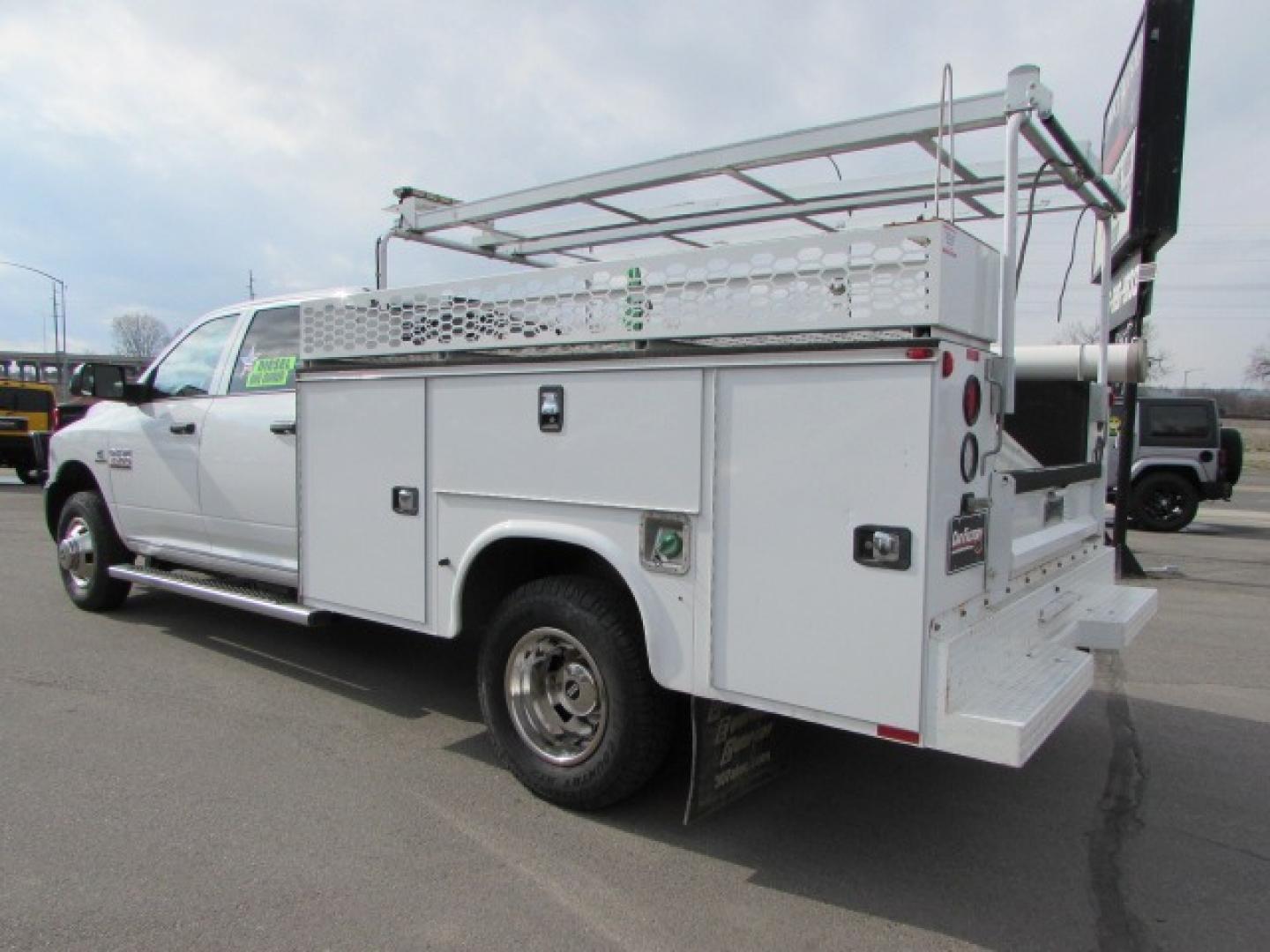 2018 White /Gray RAM 3500 Service Body Crew Cab 4WD (3C7WRTCL2JG) with an 6.7 I6 Cummins Turbo Diesel engine, Automatic transmission transmission, located at 4562 State Avenue, Billings, MT, 59101, (406) 896-9833, 45.769516, -108.526772 - Photo#1